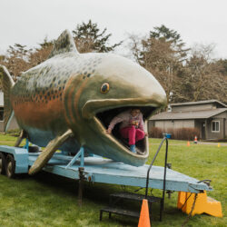 student climbing out of the giant chinook's mouth