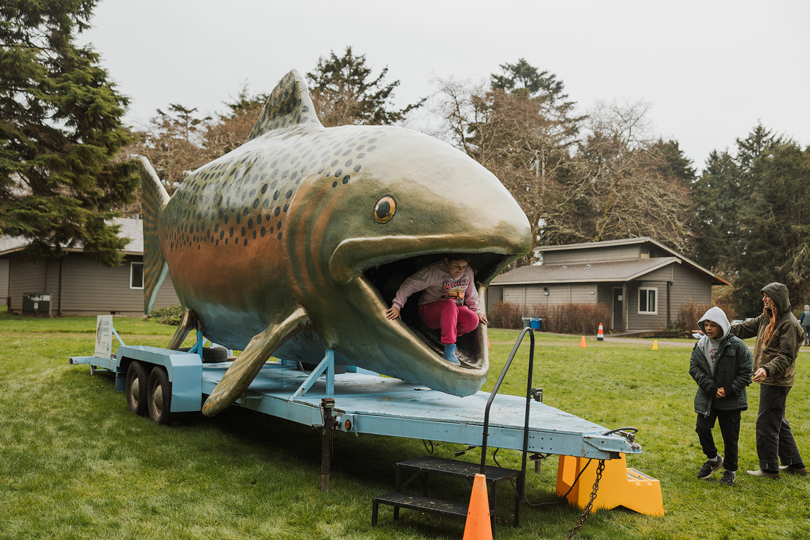 student climbing out of the giant chinook's mouth